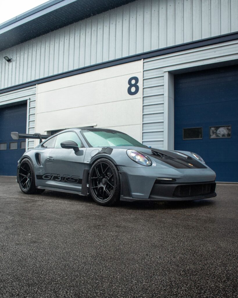 Grey Porsche 992 GT3 RS Weissach with full PPF, front three-quarter view outside Wrapd Studios in Knaresborough