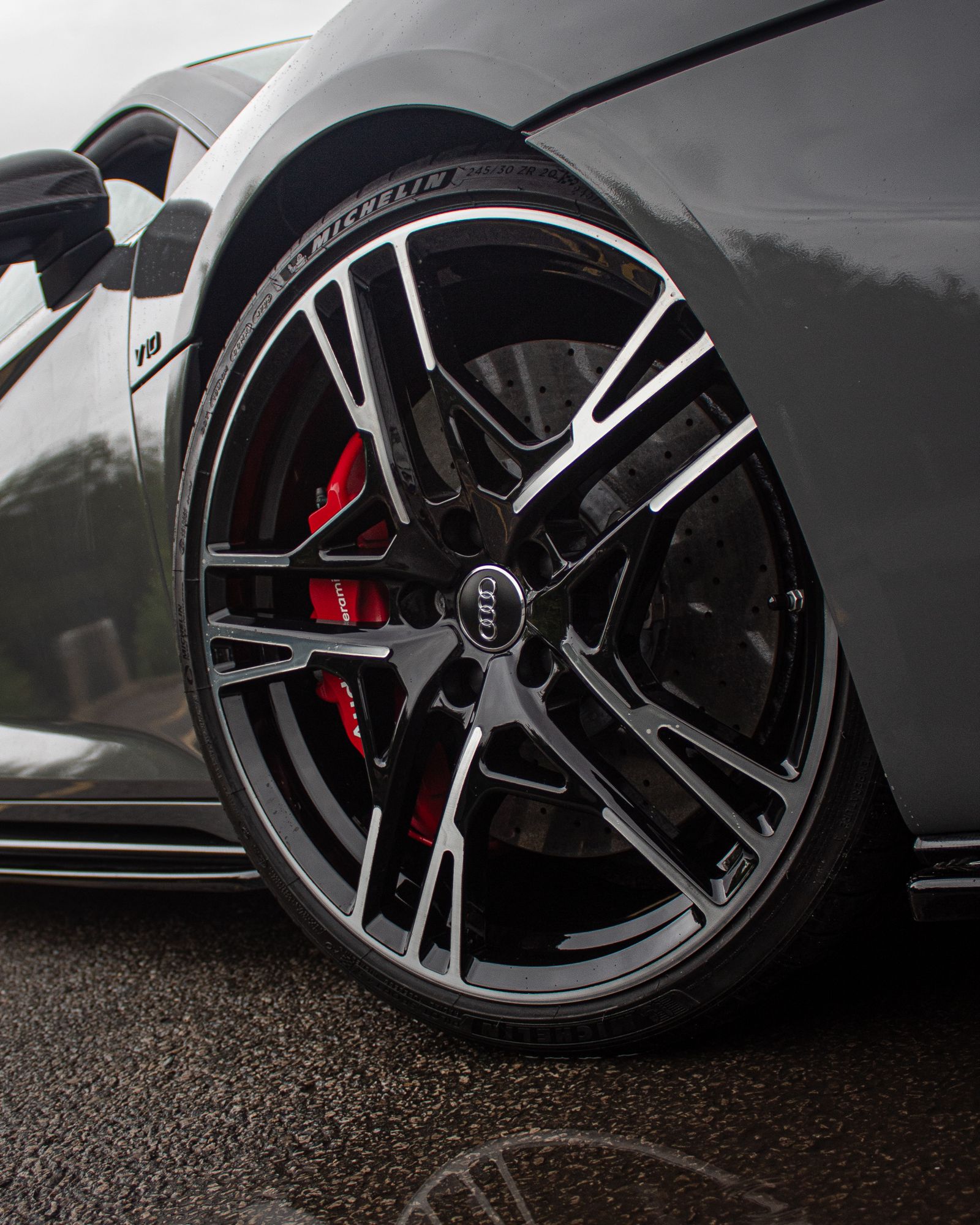 Grey Audi R8, wheel and red caliper detail