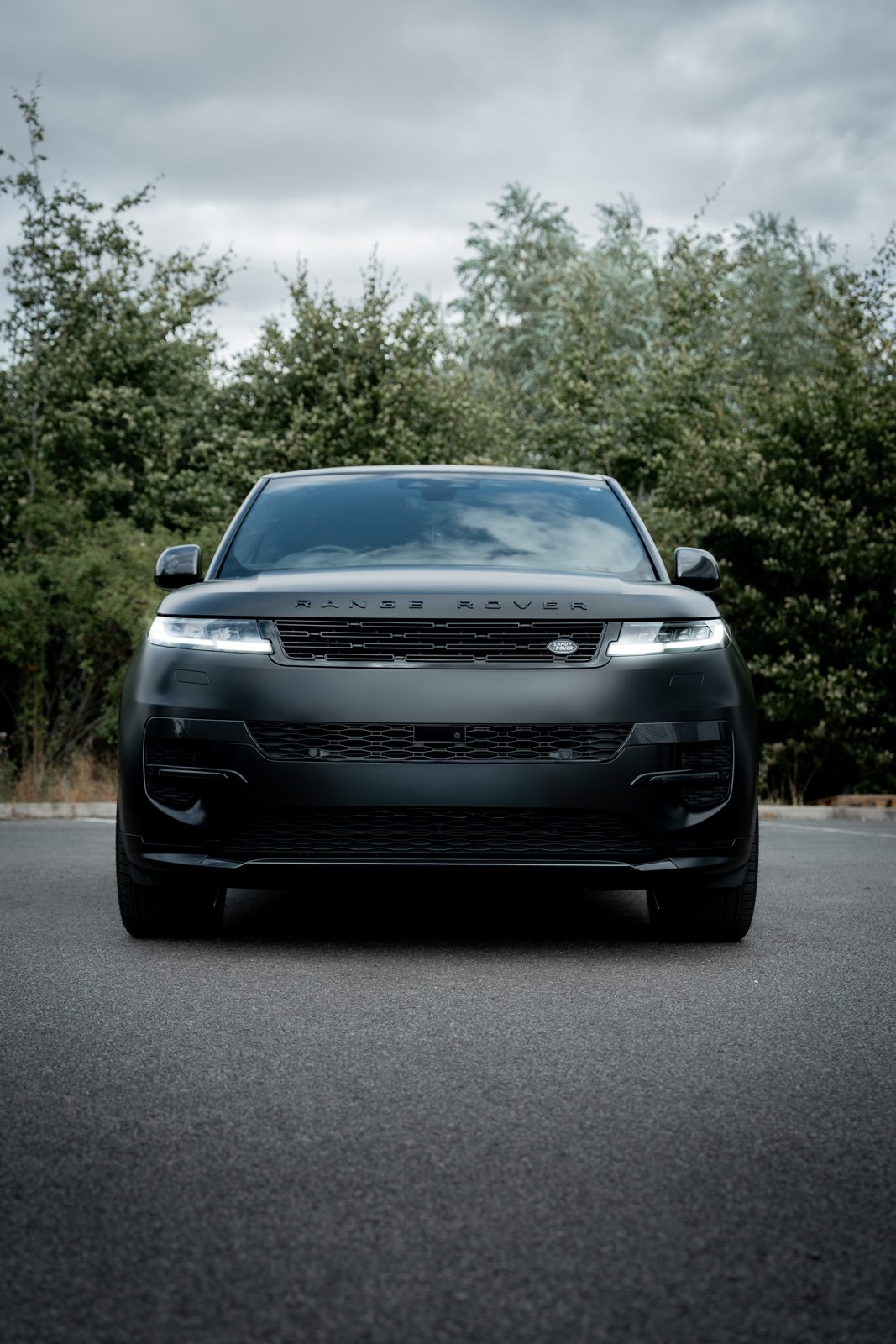 Black Range Rover Sport with blacked-out trim, front view