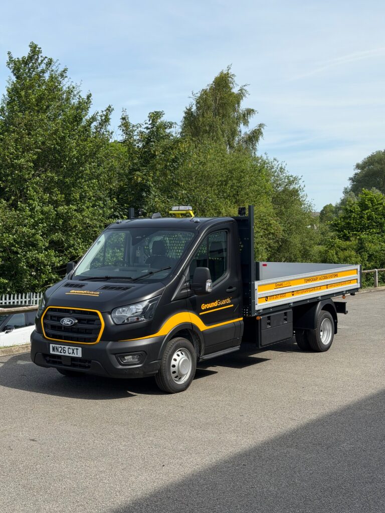 Ground Guards Ford Transit tipper in black and yellow fleet livery by Wrapd Studios