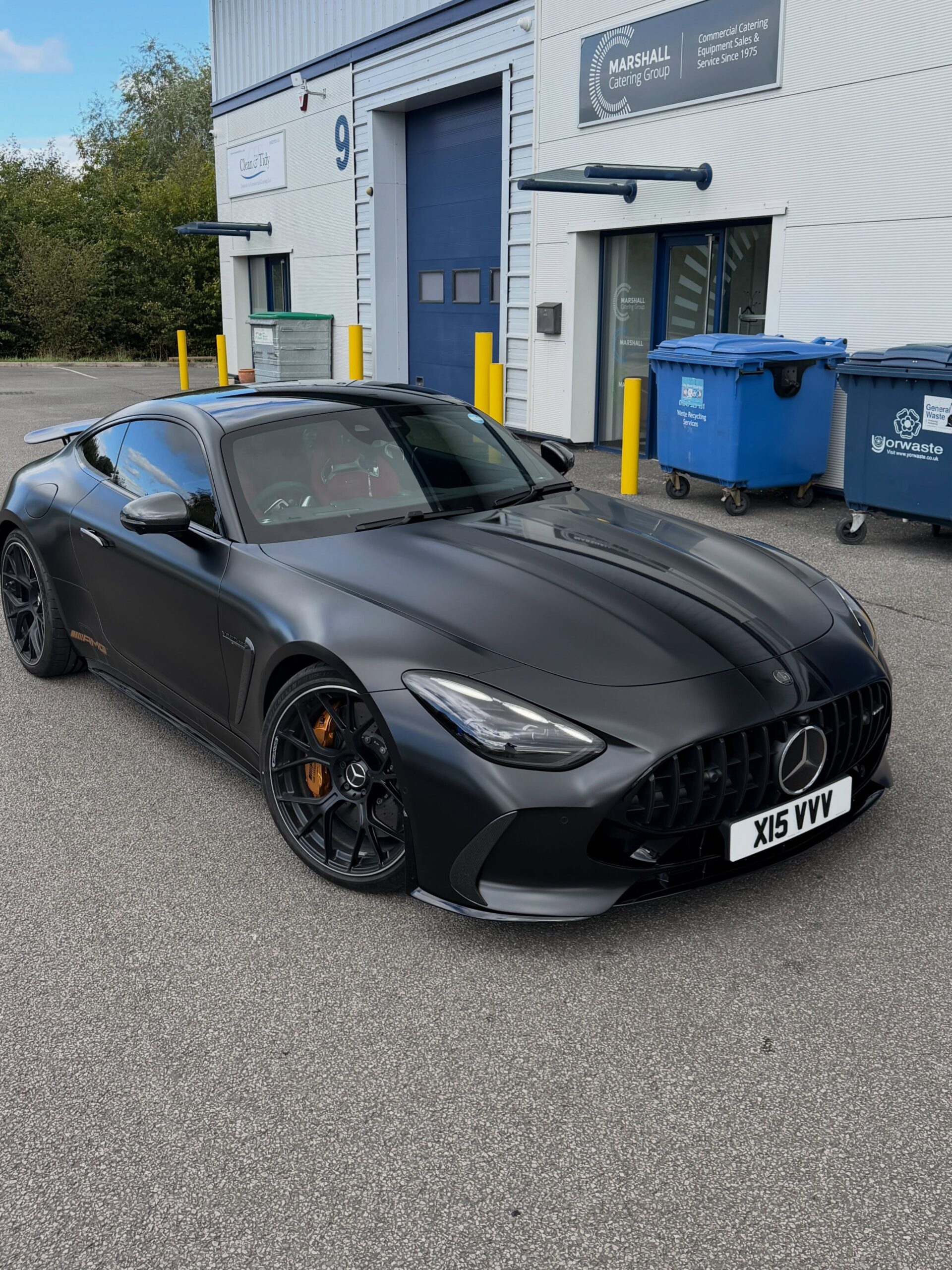 Satin black Mercedes-AMG GT 63 outside Wrapd Studios