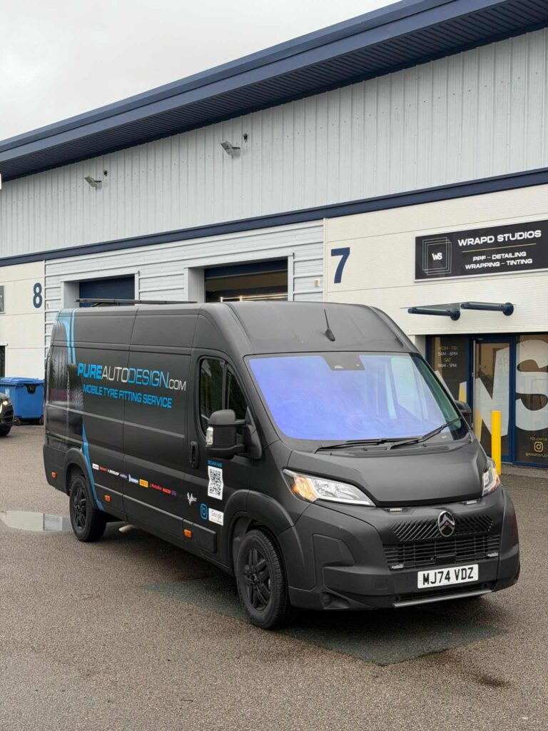 Matt black Pure Auto Design van wrap outside Wrapd Studios, Knaresborough