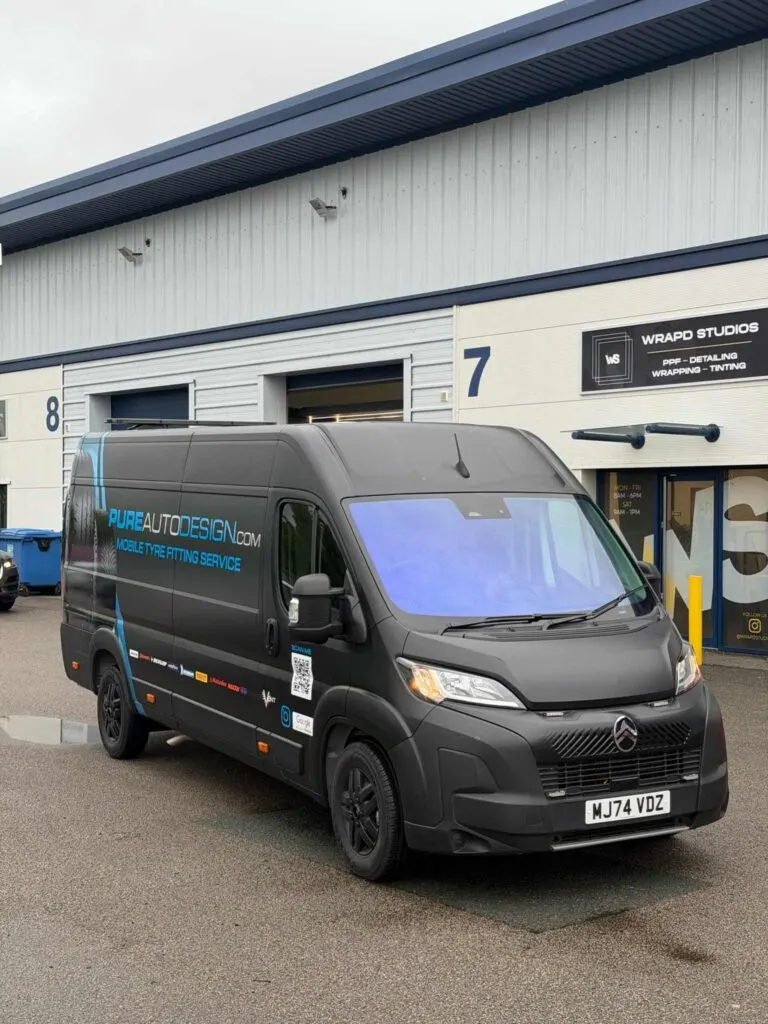 Matt black Pure Auto Design van wrap outside Wrapd Studios, Knaresborough.
