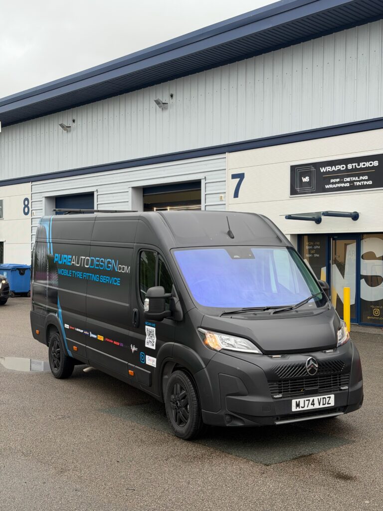 Matt black Pure Auto Design van wrap outside Wrapd Studios, Knaresborough.