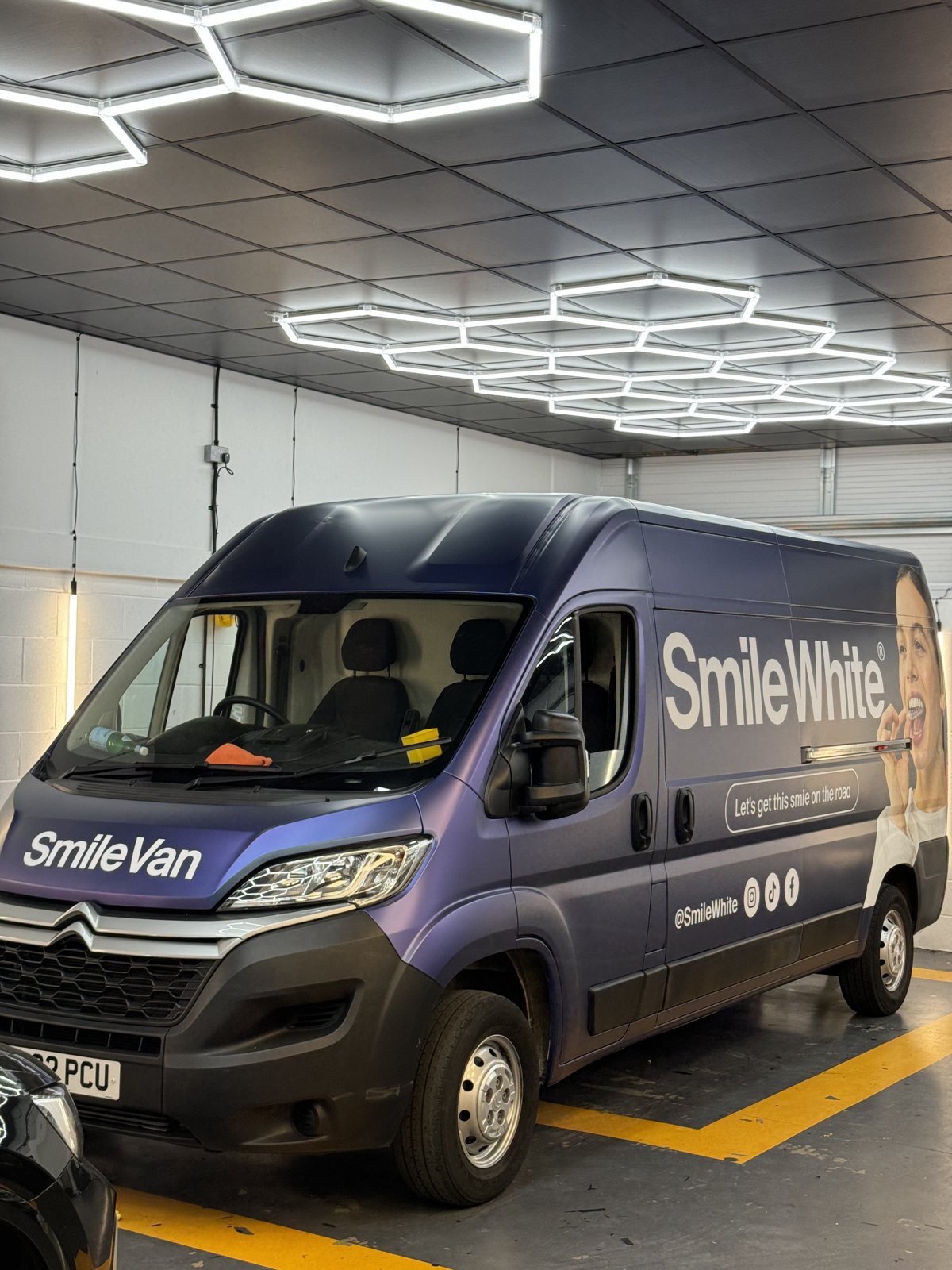 Finished SmileWhite printed van wrap by Wrapd Studios